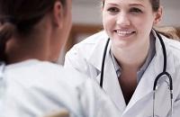 female doctor talking to a patient
