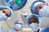 Medical providers in surgical masks